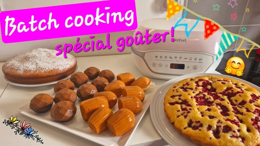 Photographie du résultat d'une séance de batch cooking spécial goûters réalisée au Cake Factory Infinity de Tefal : gâteau aux framboises, gâteau moelleux à la vanille, madeleines à la fleur d'oranger et rochers au cacao