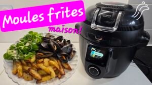 Photographie d'une assiette de moules accompagnées de frites fraîche maison et d'une salade verte réalisée au Cookeo infinity de Moulinex